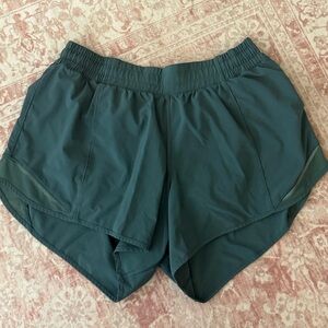 Green lululemon hotty hot shorts - size 10 tall 4 in